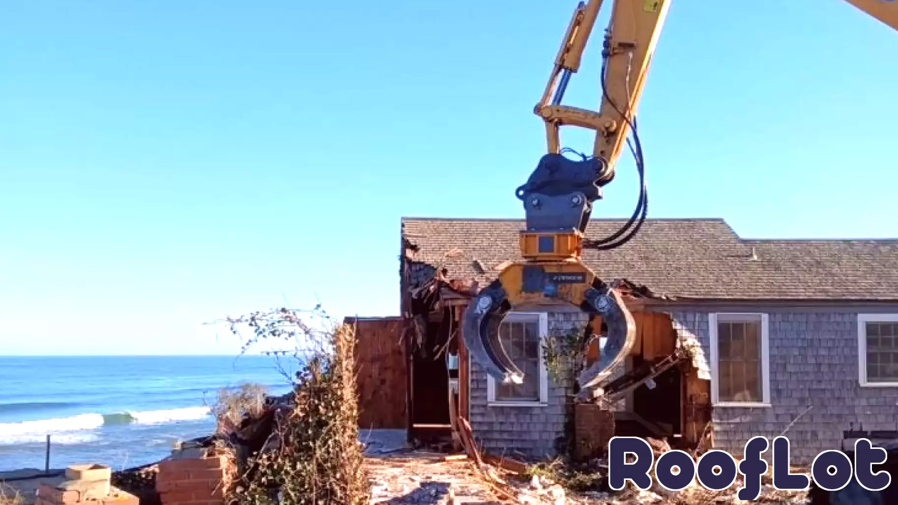 Cape Cod house with Watergate ties falls victim to eroding bluff
